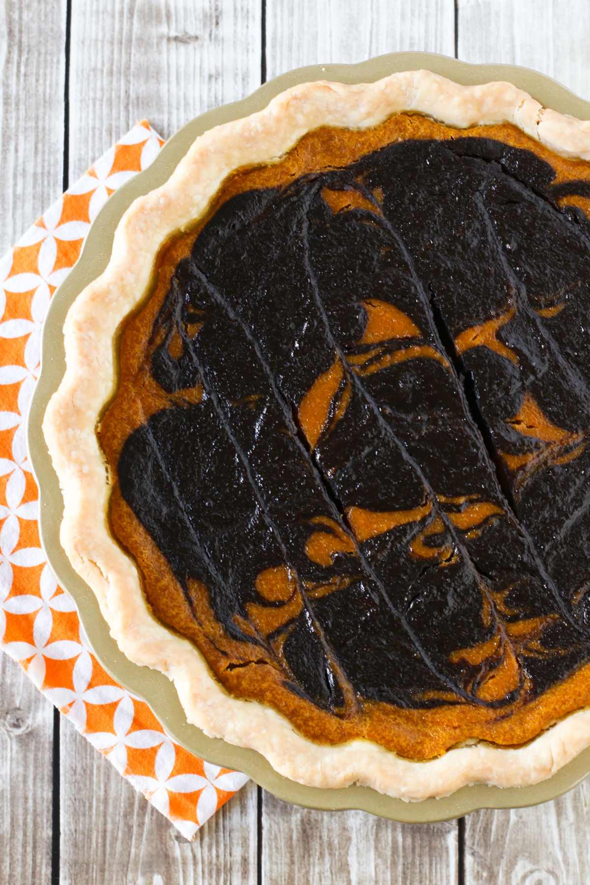Gluten Free Vegan Chocolate Swirled Pumpkin Pie. Classic pumpkin pie with a chocolate twist!