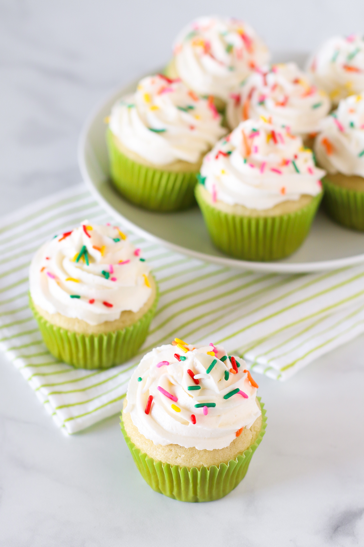 Gluten Free Vegan Vanilla Cupcakes. Light, fluffy cupcakes with a whipped, creamy vanilla buttercream. Just about the perfect allergen free cupcake!