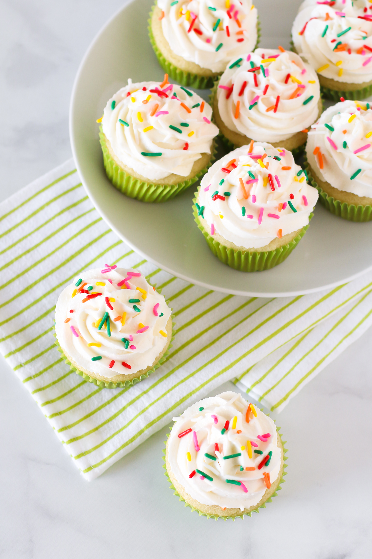Gluten Free Vegan Vanilla Cupcakes. Light, fluffy cupcakes with a whipped, creamy vanilla buttercream. Allergen free and perfect for any celebration!