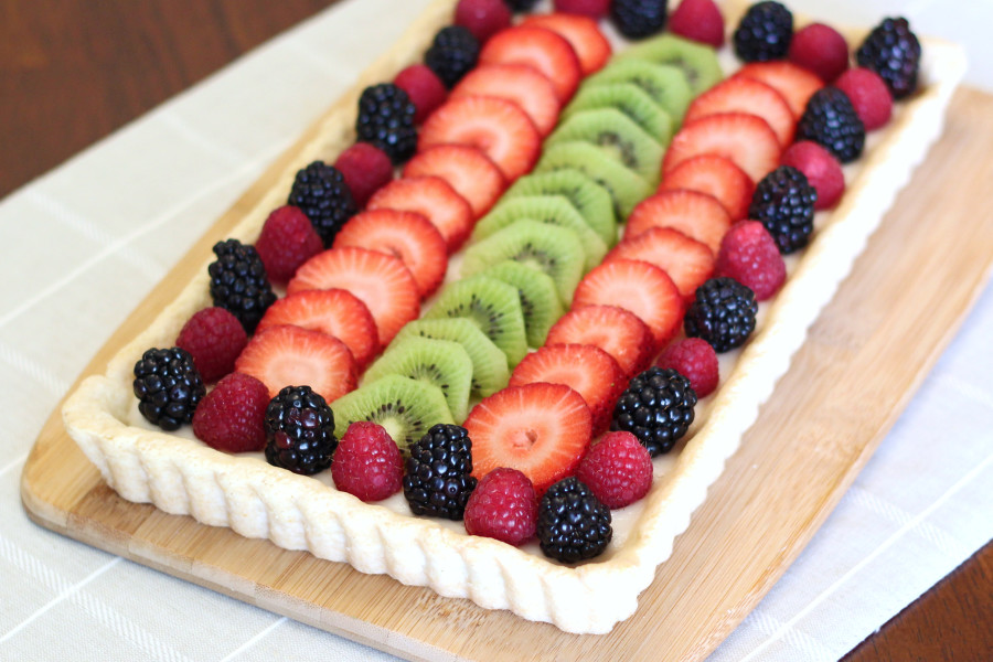 Gluten Free Vegan Fresh Fruit Tart. A bright and fresh dessert, perfect for springtime! Recipe found at Sarah Bakes Gluten Free.