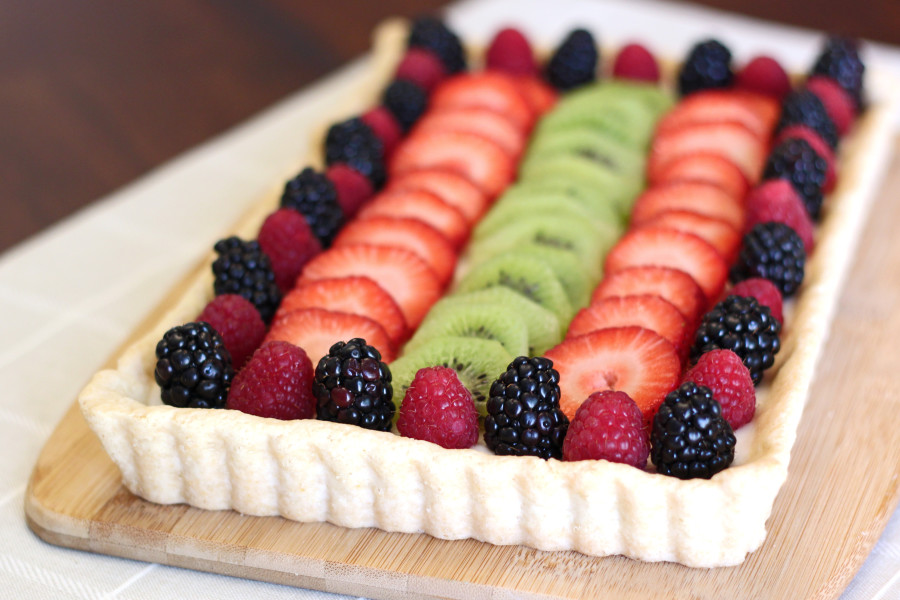 Gluten Free Vegan Fresh Fruit Tart. A bright and fresh dessert, perfect for springtime! Recipe found at Sarah Bakes Gluten Free.