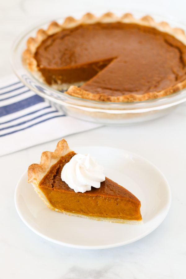 Gluten Free Vegan Pumpkin Pie. Flakey crust with a creamy, perfectly spiced pumpkin filling. This pumpkin pie is suitable for any holiday gathering!