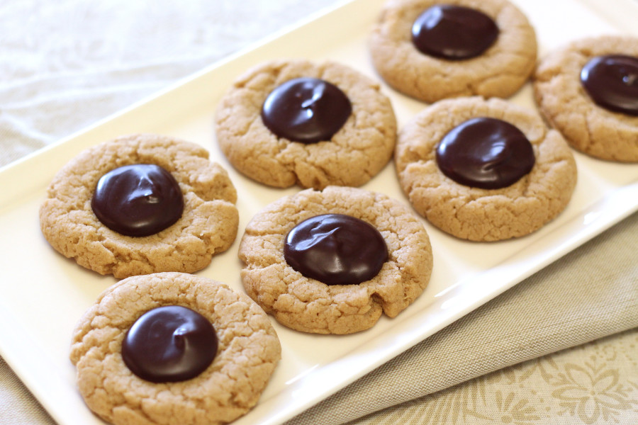 Gluten Free Vegan Peanut Butter Chocolate Thumbprint Cookies. Soft peanut butter cookies with a chocolate ganache in the center. 