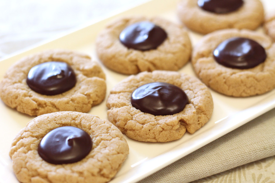 Gluten Free Vegan Peanut Butter Chocolate Thumbprint Cookies. Soft peanut butter cookies with a chocolate ganache in the center. 