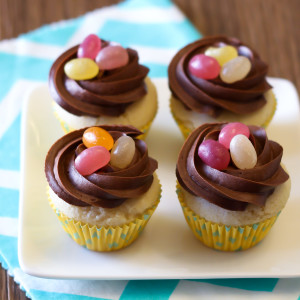 Gluten Free Vegan Mini Chocolate Nest Cupcakes. An allergen free Easter treat for all! Recipe found at Sarah Bakes Gluten Free.