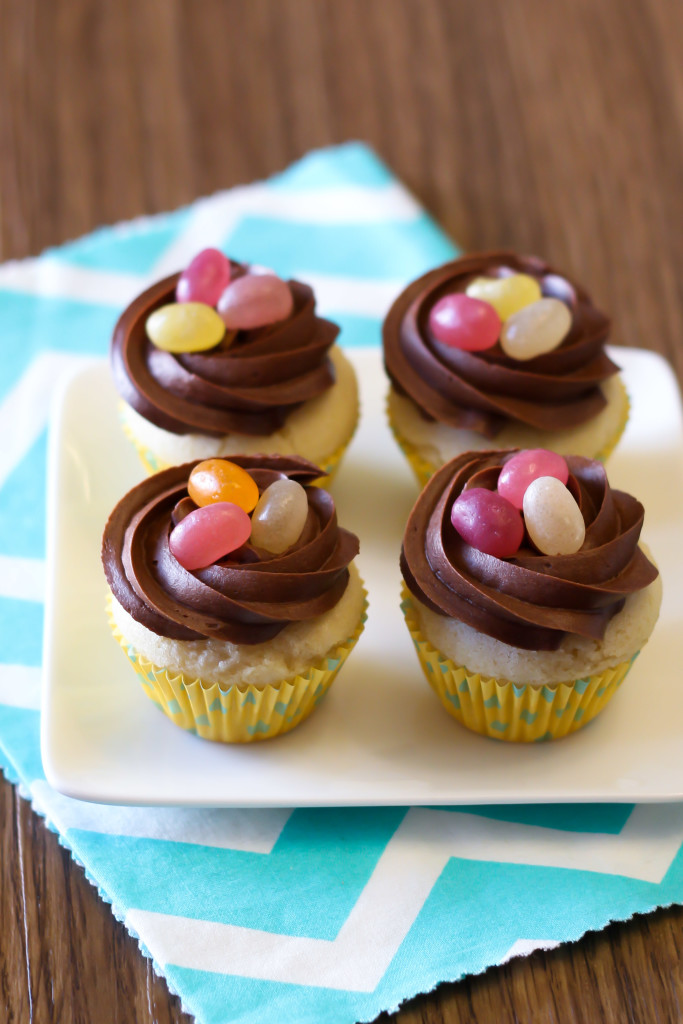 Gluten Free Vegan Mini Chocolate Nest Cupcakes. An allergen free Easter treat for all! Recipe found at Sarah Bakes Gluten Free.