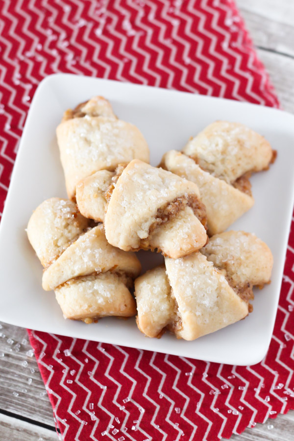 Gluten Free Vegan Walnut Crescent Cookies. Soft crescent cookies with a cinnamon walnut filling and a sprinkling of sparkling sugar on top.