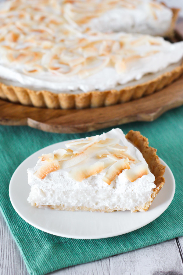 Gluten Free Vegan Coconut Cream Pie. Dreamy, creamy coconut pudding, topped with whipped coconut cream. Recipe found at Sarah Bakes Gluten Free!