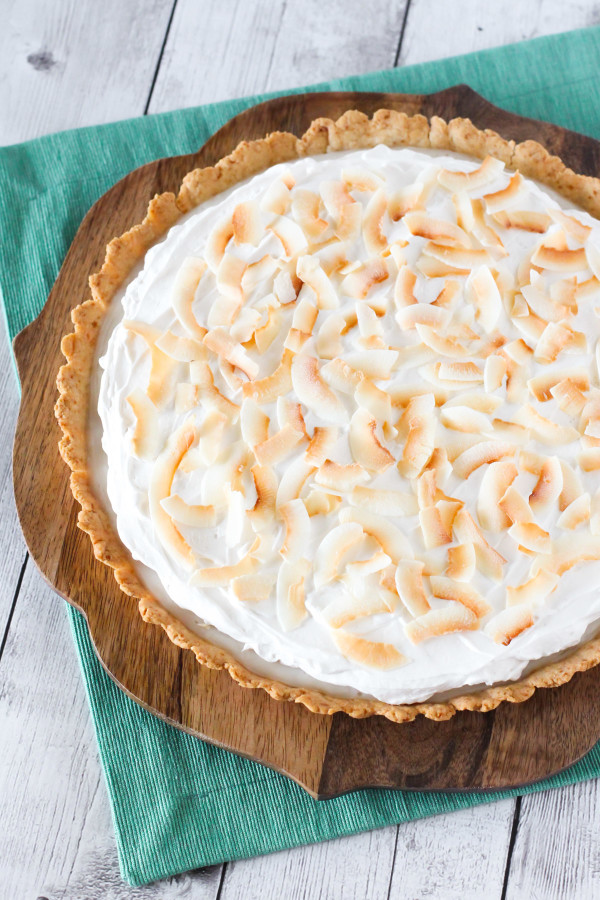 Gluten Free Vegan Coconut Cream Pie. Dreamy, creamy coconut pudding, topped with whipped coconut cream. Recipe found at Sarah Bakes Gluten Free!