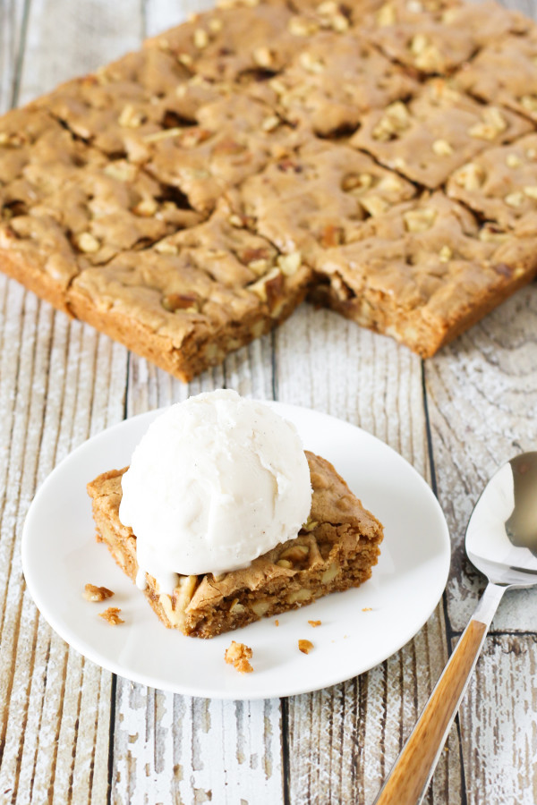 Gluten Free Vegan Maple Walnut Blondies. Crispy edges, chewy on the inside and loaded crunchy walnuts. A scoop of vanilla ice cream takes it over the top!