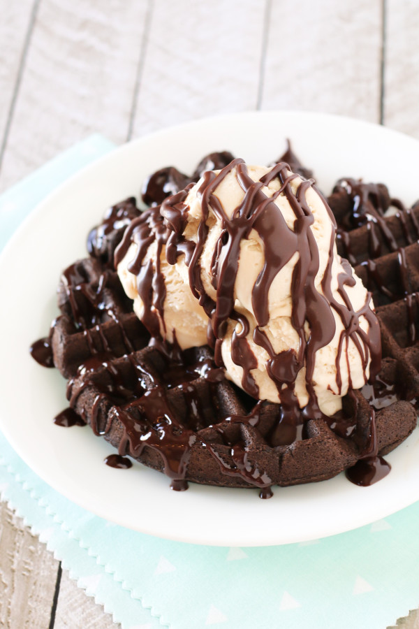 Gluten Free Vegan Chocolate Fudge Waffle Sundaes. Chewy chocolate waffles, topped with vanilla ice cream and warm chocolate ganache. HEAVENLY! 