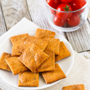 Gluten Free Vegan Pizza Crackers. A crispy, baked cracker that has all the herbs and flavors of a slice of pizza!