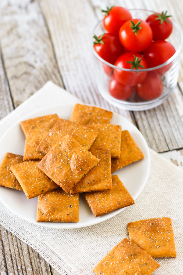 Gluten Free Vegan Pizza Crackers. A crispy, baked cracker that has all the herbs and flavors of a slice of pizza!