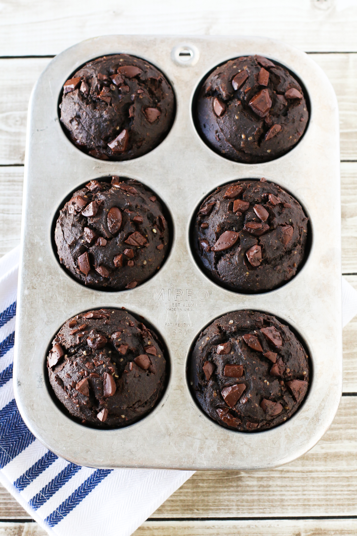 Gluten Free Vegan Dark Chocolate Muffins. Refined sugar free, these muffins are even packed with protein and a secret ingredient!