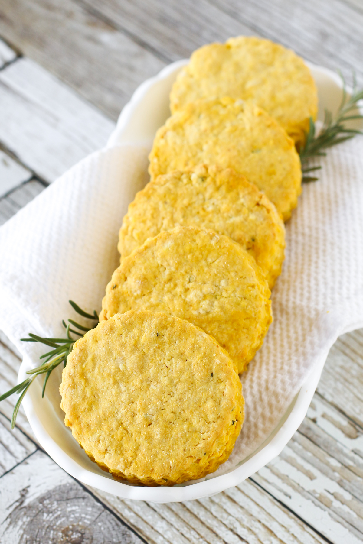 Gluten Free Vegan Rosemary Pumpkin Biscuits. With flavors of pumpkin and rosemary, these biscuits are perfect served with any hearty soup!