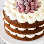 gluten free vegan gingerbread layer cake with sugared cranberries