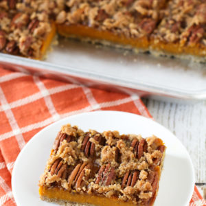 Gluten Free Vegan Pecan Pumpkin Pie Bars. Oat crust, creamy pumpkin filling and sugar crumble pecan topping. Easy-peasy and a fall favorite!