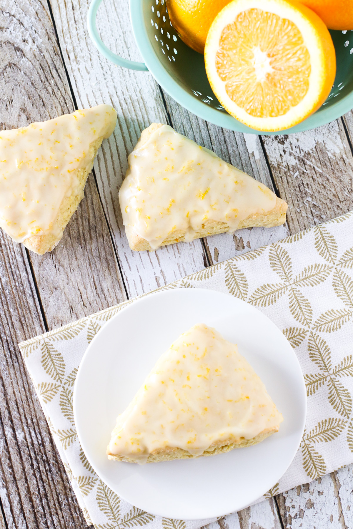 Gluten Free Vegan Sweet Orange Scones. Tender orange scones covered with a sweet, fresh orange glaze. 