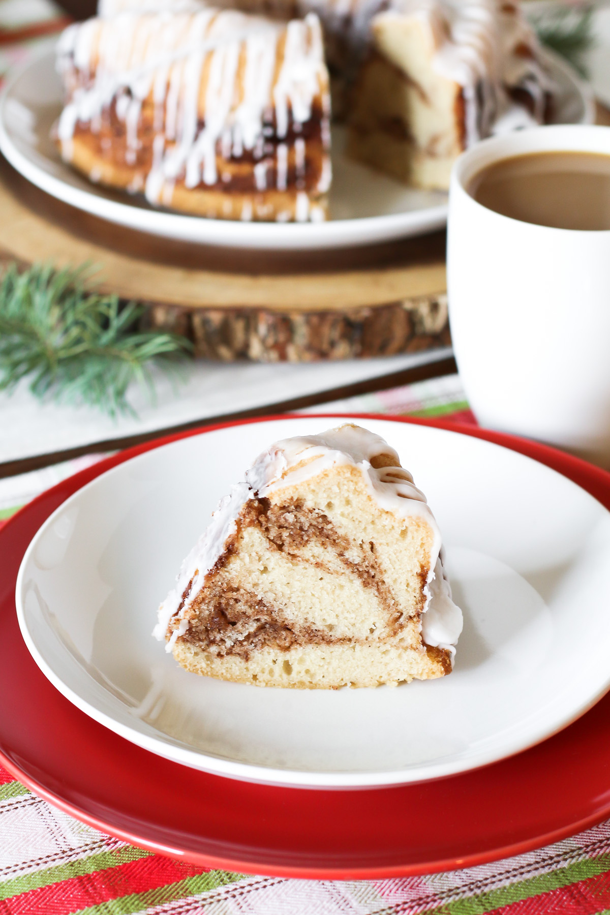 Gluten Free Vegan Cinnamon Roll Coffee Cake. Layers of light vanilla cake and cinnamon sugar, baked to perfection. That simple glaze over the top is a must!