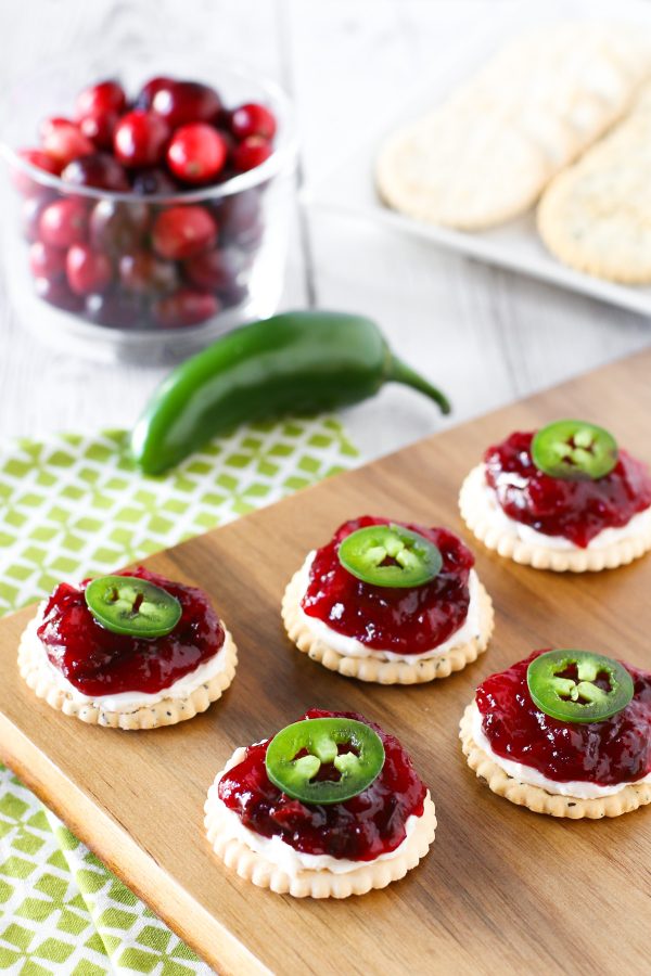 Sweet and Spicy Cranberry Jalapeño Chutney. Served on top of Glutino gluten free crackers with a little dairy free cream cheese and fresh jalapeño slices.