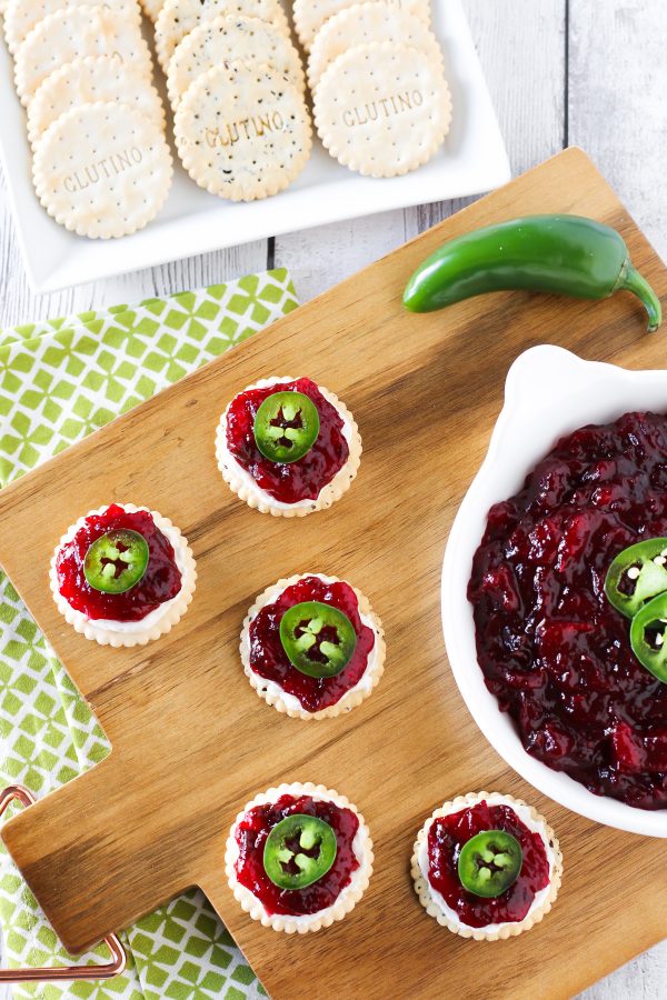 Sweet and Spicy Cranberry Jalapeño Chutney. Served on top of Glutino gluten free crackers with a little dairy free cream cheese and fresh jalapeño slices.