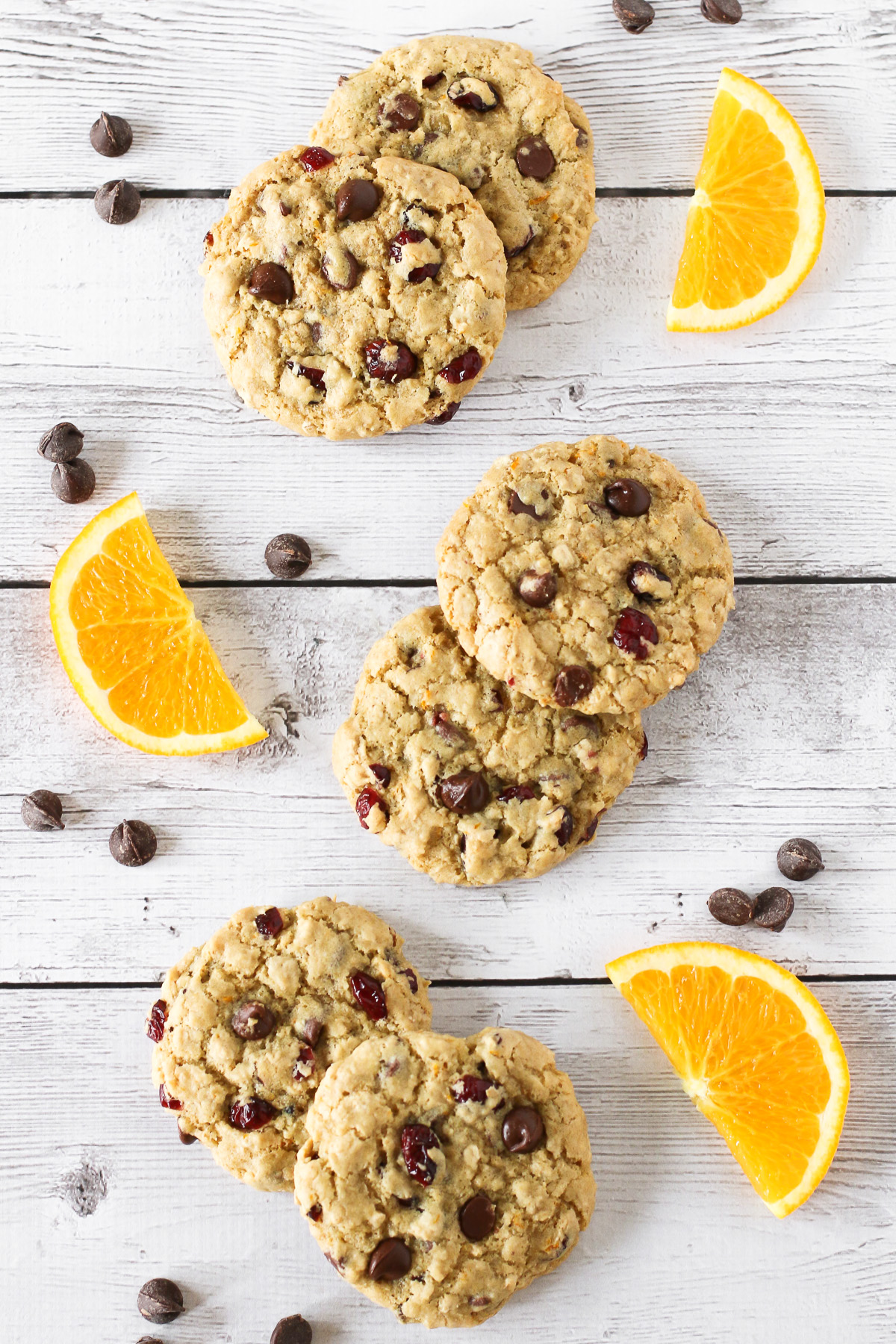 Gluten Free Vegan Cranberry Orange Chocolate Chip Cookies. Chewy cookies with orange zest, dried cranberries and lots of dark chocolate chips!