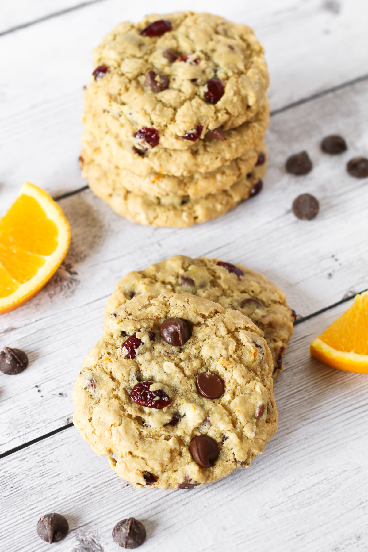 Gluten Free Vegan Cranberry Orange Chocolate Chip Cookies. Chewy cookies with orange zest, dried cranberries and lots of dark chocolate chips!