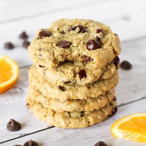 Gluten Free Vegan Cranberry Orange Chocolate Chip Cookies. Chewy cookies with orange zest, dried cranberries and lots of dark chocolate chips!