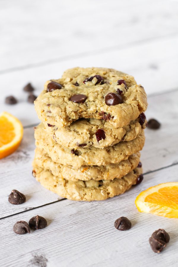 Gluten Free Vegan Cranberry Orange Chocolate Chip Cookies. Chewy cookies with orange zest, dried cranberries and lots of dark chocolate chips!