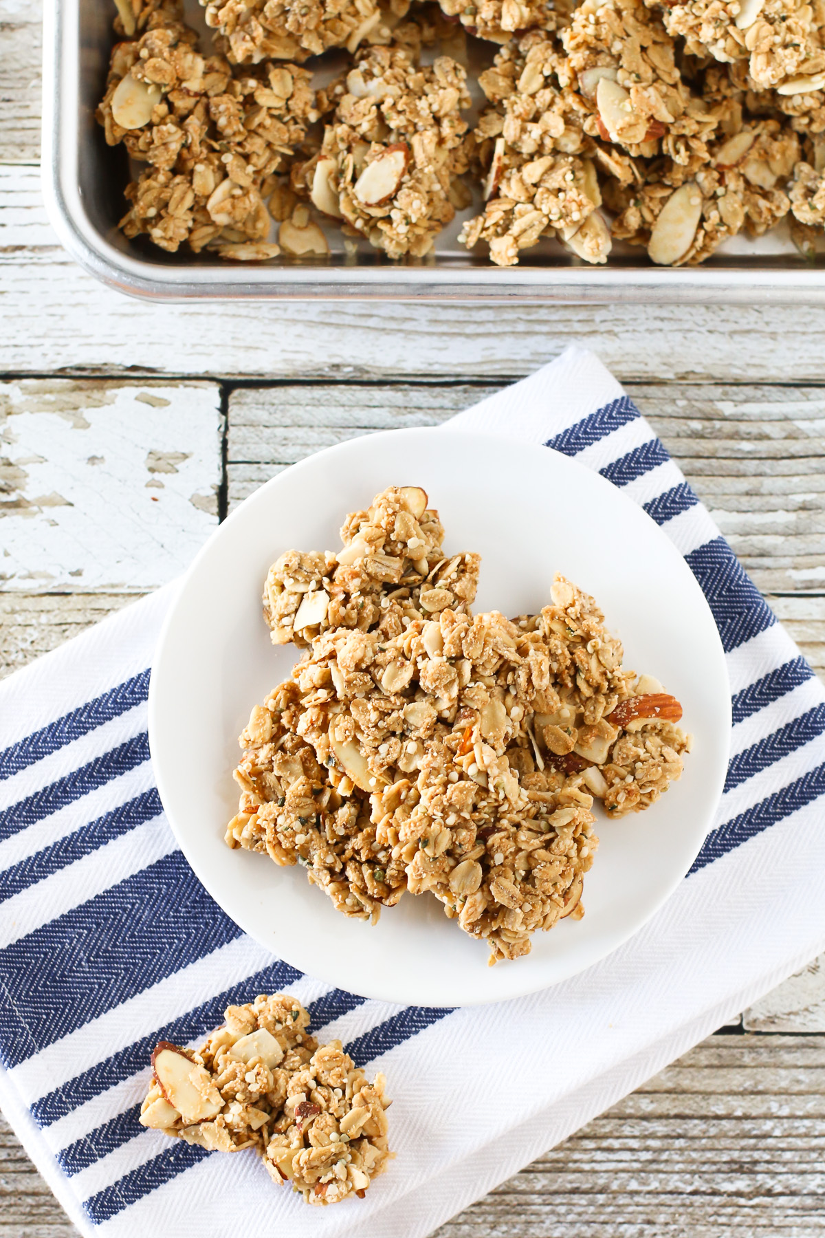 Gluten free vegan maple almond granola clusters. The best part of granola! Crunchy clusters of maple-sweetened granola, packed with almonds and completely irresistible. 