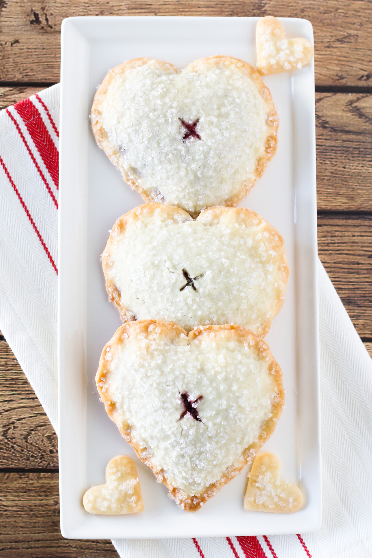 Gluten Free Vegan Sweetheart Cherry Hand Pies. Heart-shaped flakey pastry with a sweet, dark cherry filling. 