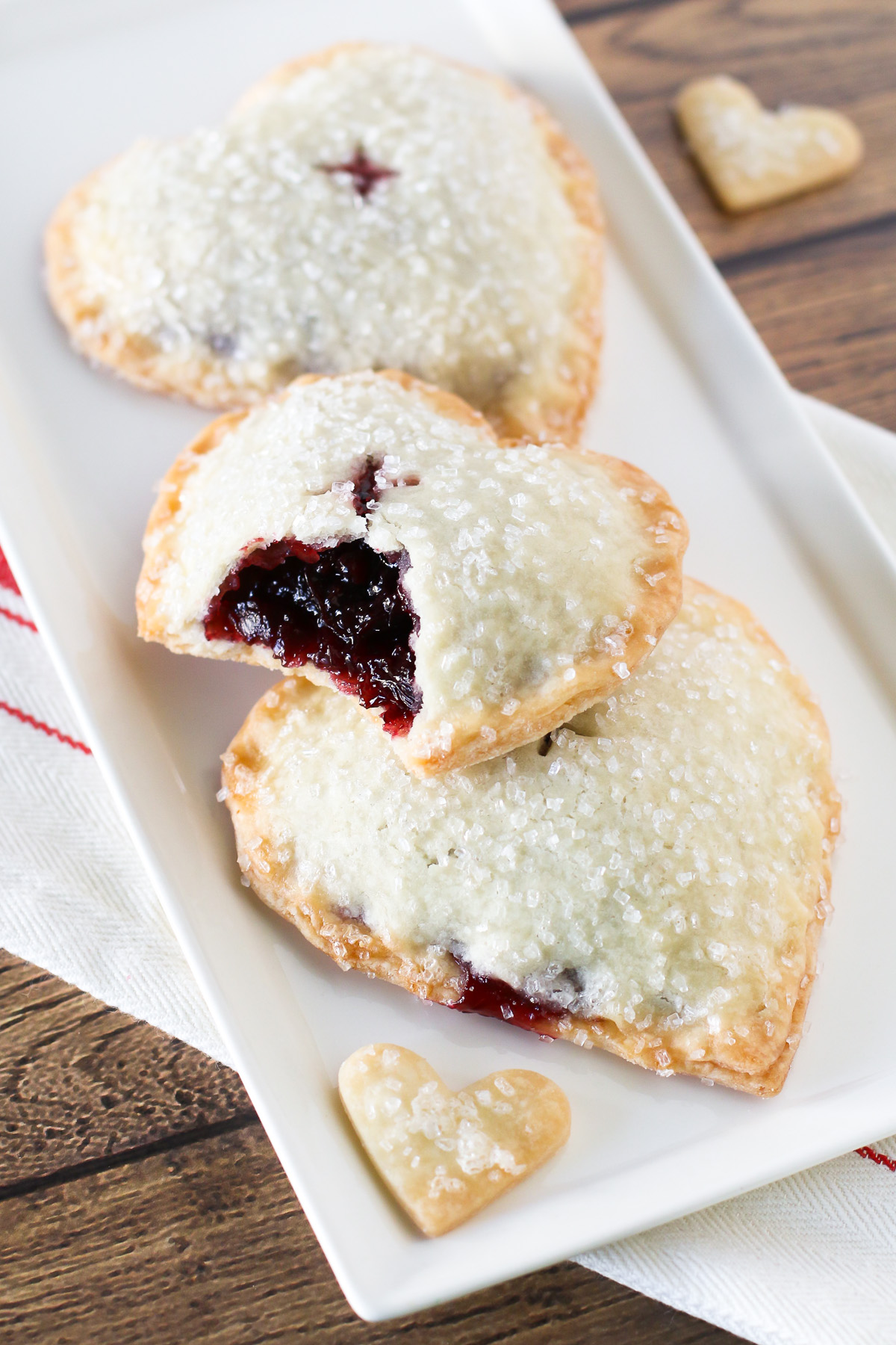 Gluten Free Vegan Sweetheart Cherry Hand Pies. Heart-shaped flakey pastry with a sweet, dark cherry filling. 