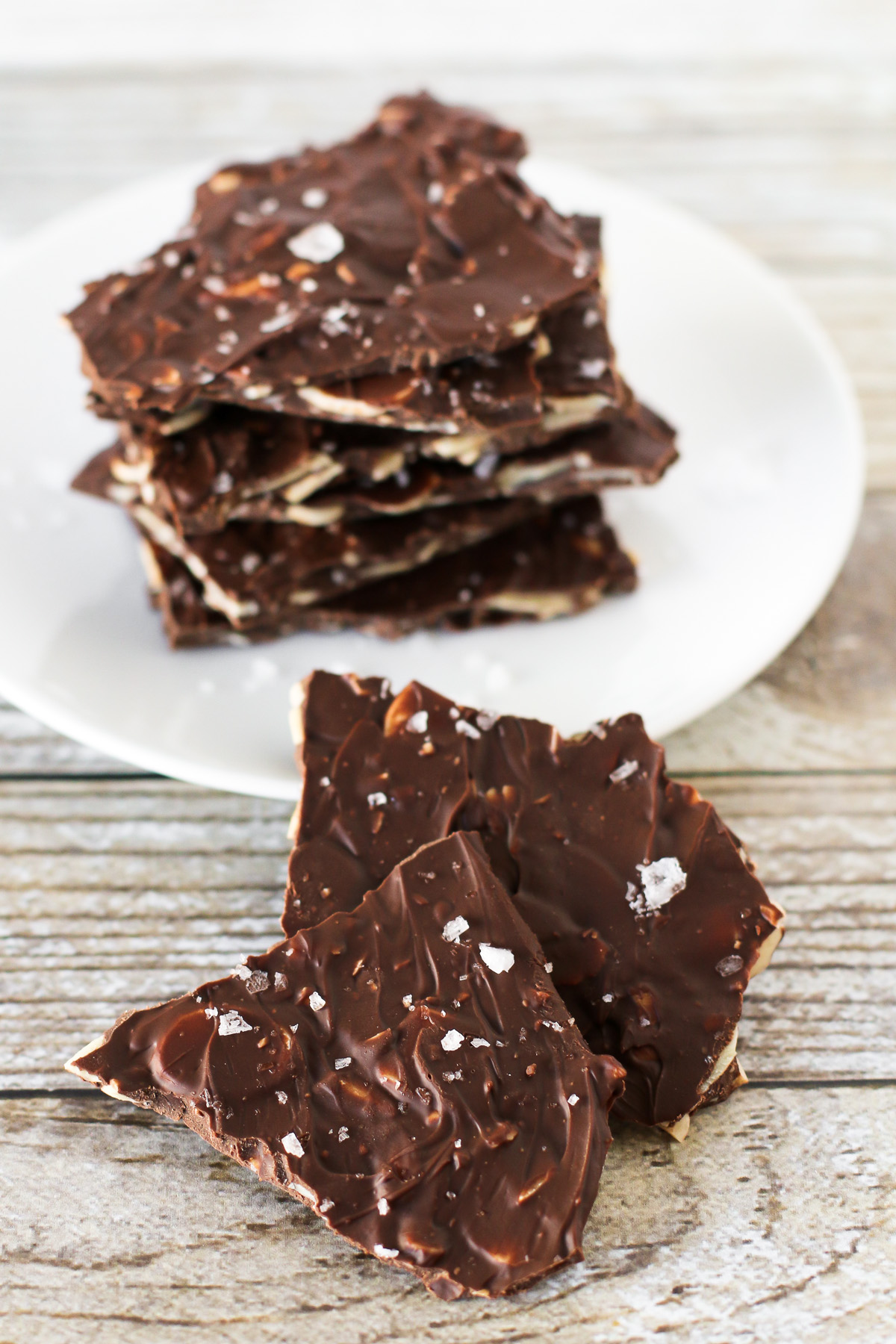 Sea Salt Chocolate Almond Bark. Thin layer of toasted sliced almonds, coated in chocolate and sprinkled with flaked sea salt. 