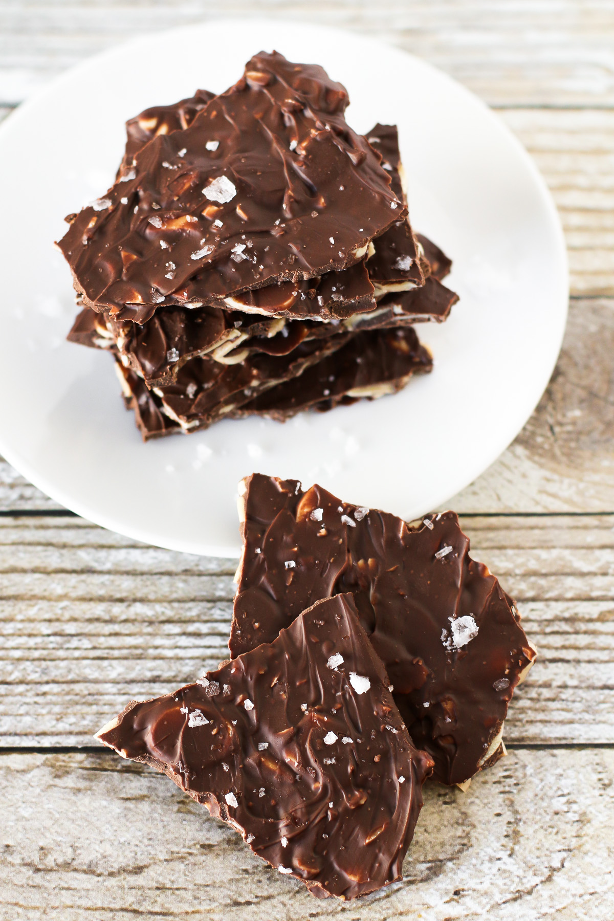 Sea Salt Chocolate Almond Bark. Thin layer of toasted sliced almonds, coated in chocolate and sprinkled with flaked sea salt. 