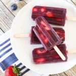 Berry Smoothie Popsicles. Made with strawberries, blueberries, bananas and flaxseed milk. These healthy smoothie popsicles are perfect for those hot summer days!