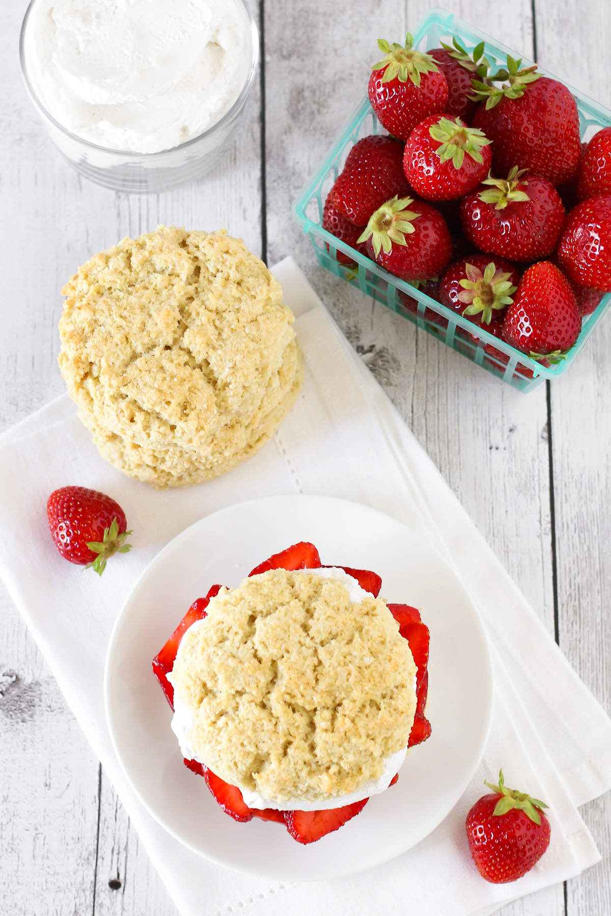 Gluten Free Vegan Classic Strawberry Shortcake. Soft, sweet biscuits, filled with fresh strawberries and whipped coconut cream. A classic summertime dessert!