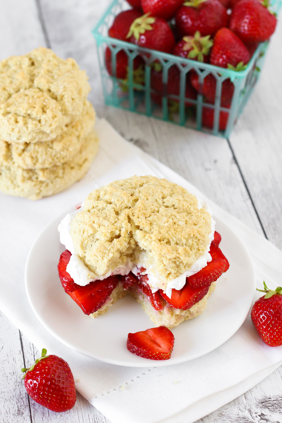 Gluten Free Vegan Classic Strawberry Shortcake. Soft, sweet biscuits, filled with fresh strawberries and whipped coconut cream.