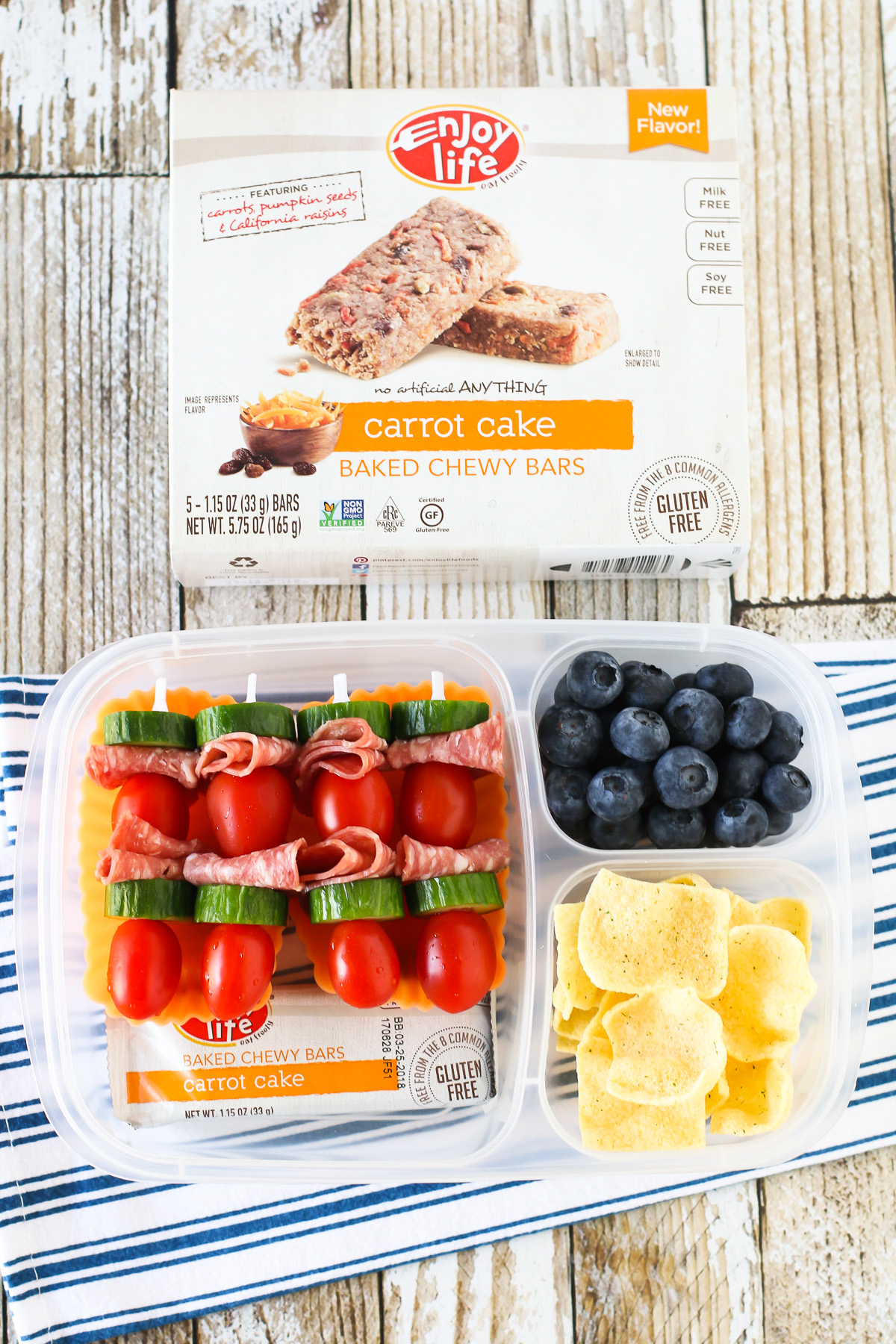 Easy Allergen Free School Lunches. Tomato, cucumber and salami skewers, served with an Enjoy Life Baked Chewy Bar. 