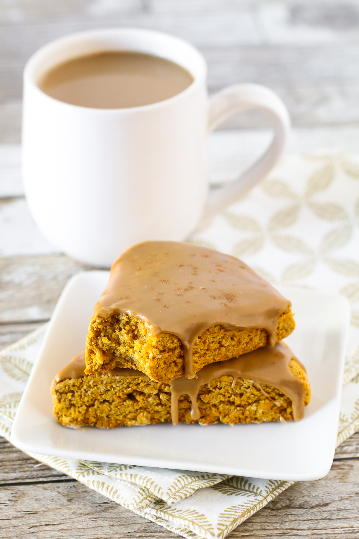 Gluten Free Vegan Pumpkin Spice Latte Scones. Tender pumpkin scones with a simple espresso glaze. So dreamy!