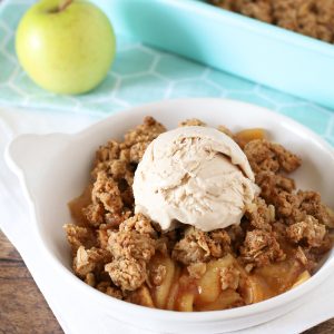 Gluten Free Vegan Apple Crumble. Tender cinnamon apples, topped with a refined sugar free oat crumble. Warm and comforting!