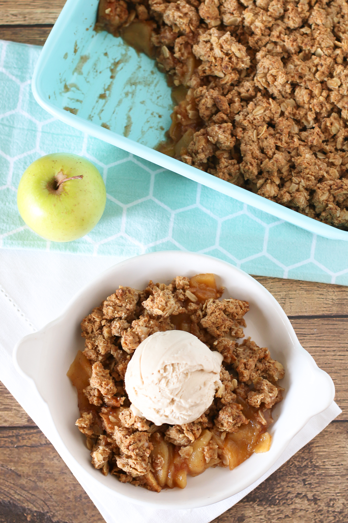 Gluten Free Vegan Apple Crumble. Tender cinnamon apples, topped with a refined sugar free oat crumble. Warm and comforting.