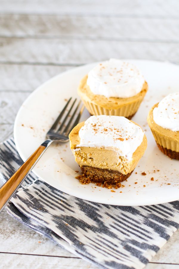 Gluten Free Vegan Mini Pumpkin Cheesecakes. Creamy cashew based cheesecakes with pumpkin and all the fall spices.