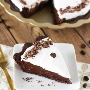 Gluten Free Vegan Mocha Cream Pie. Chocolate cookie crust filled with a decadent dairy free mocha pudding. A slice of chocolaty coffee heaven!