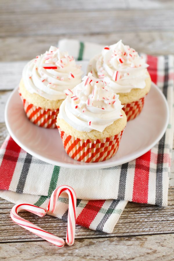 Gluten Free Vegan Candy Cane Cupcakes. Fluffy vanilla peppermint cupcakes with a peppermint buttercream. Tastes just like a candy cane!