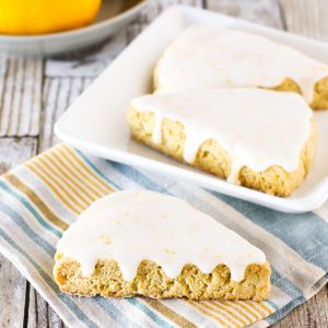 Gluten Free Vegan Glazed Lemon Scones. Tender scones with a zesty lemon glaze. An irresistible morning treat!
