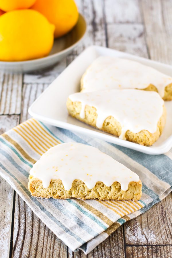 Gluten Free Vegan Glazed Lemon Scones. Tender scones with a zesty lemon glaze. An irresistible morning treat!