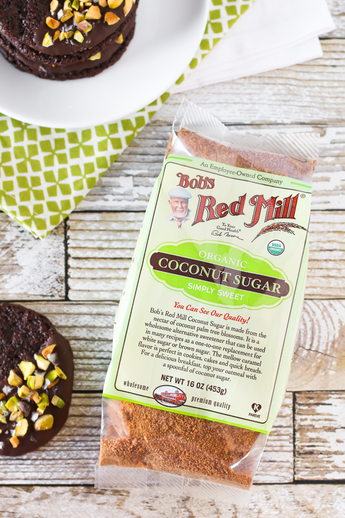 Grain Free Vegan Sea Salt Pistachio Chocolate Cookies. Made with Bob’s Red Mill Coconut Sugar, these chocolate-dipped cookies are quite decadent!