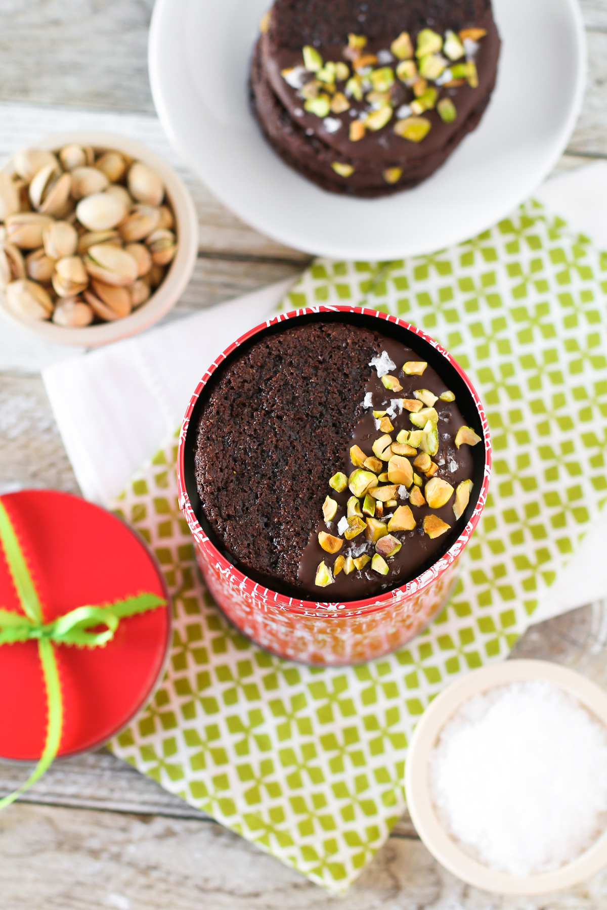 Grain Free Vegan Sea Salt Pistachio Chocolate Cookies. These chewy chocolate-dipped cookies would make a tasty holiday gift!