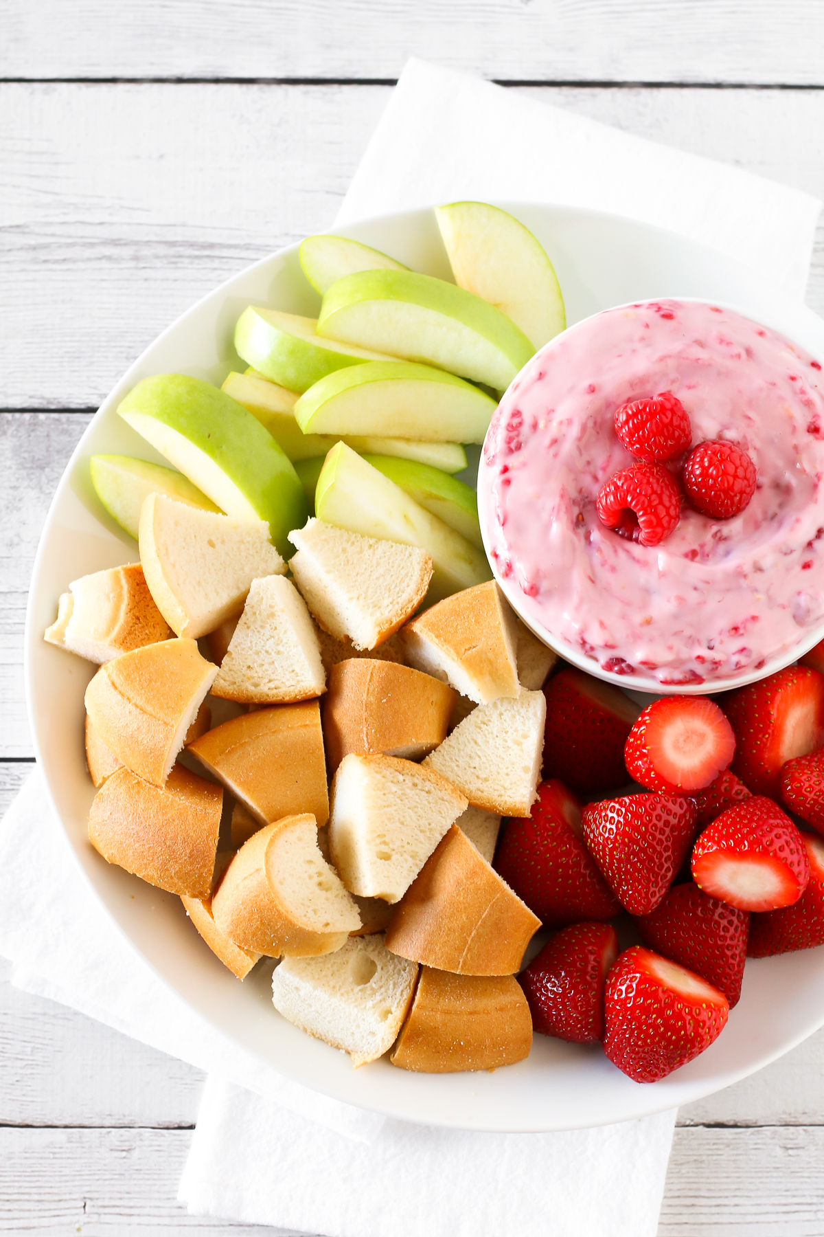 Dairy Free Raspberry Cheesecake Dip. Creamy cheesecake dip, with lemon and fresh raspberries. It’s pinkalicious!