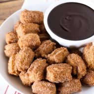 gluten free vegan churro bites with chocolate sauce